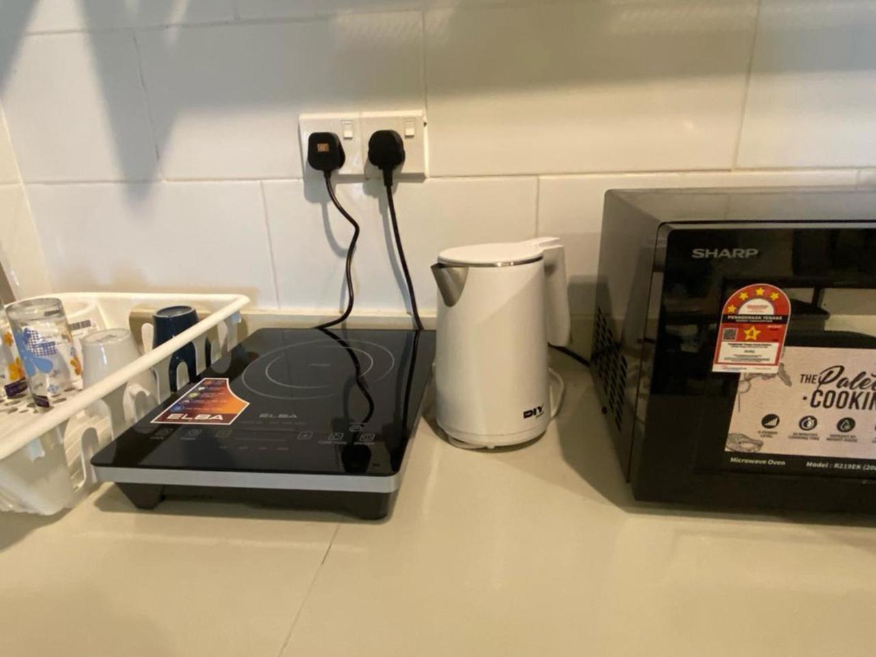 Arte Mont Kiara Aparthotel Kuala Lumpur Eksteriør bilde A kettle and a microwave oven